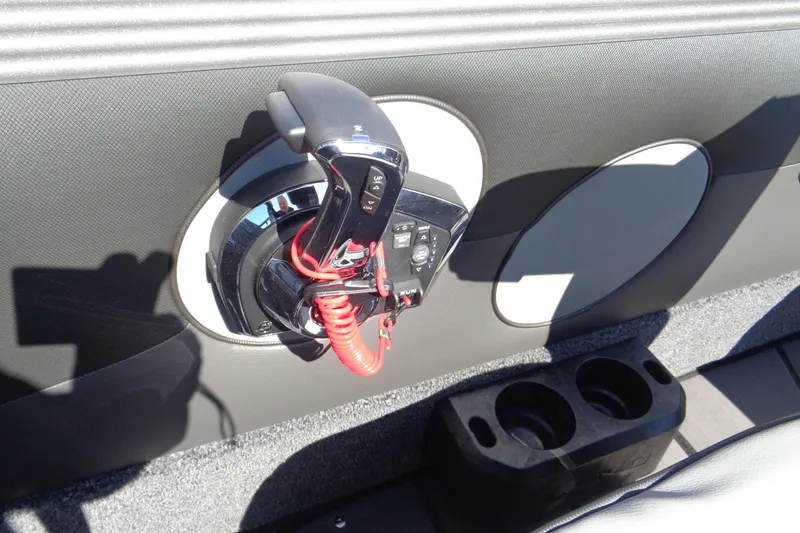 Slide: The Image of Interior of 2026 Lund 1975 Tyee boat with control panel and cup holders. - 20