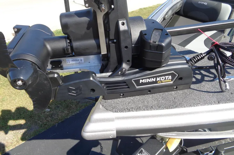 Slide: The Image of Minn Kota Ulterra motor on 2026 Lund 1975 Tyee boat, close-up view. - 7