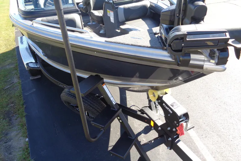 Slide: The Image of 2026 Lund 1975 Tyee boat on trailer, featuring sleek design and modern equipment. - 8