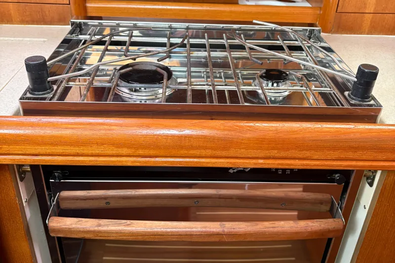 Slide: The Image of Stainless steel stove and oven in a 2006 Hunter 33 yacht kitchen. - 20