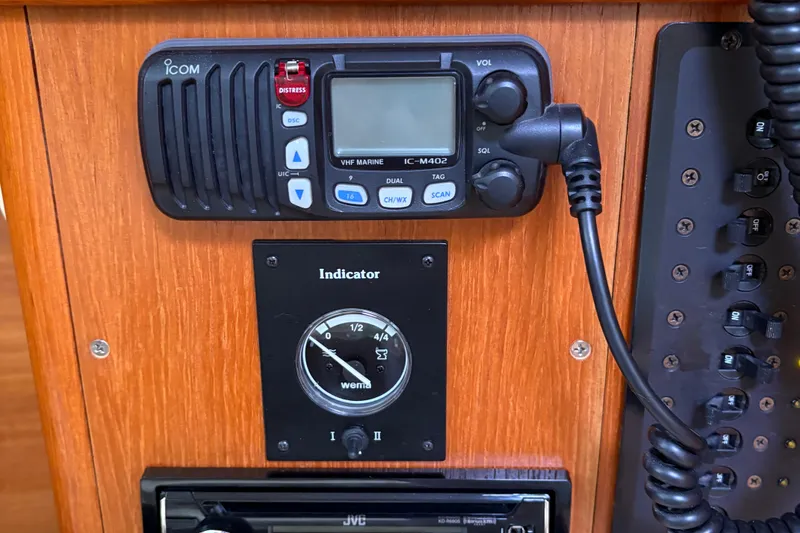 Slide: The Image of VHF marine radio and indicator panel on 2006 Hunter 33 sailboat. - 25