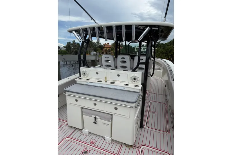 Slide: The Image of 2013 Hydra-Sports 42 boat interior with seating and fishing equipment. - 18