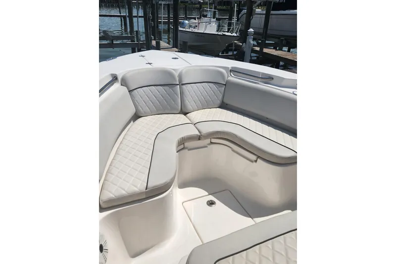 Slide: The Image of 2019 Sea Fox 266 Commander boat interior with cushioned seating and elegant design. - 7