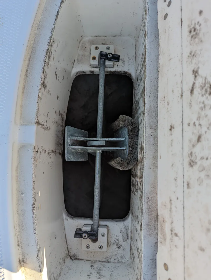 Slide: The Image of Anchor storage compartment on a 2017 Mako 204 Center Console boat. - 11