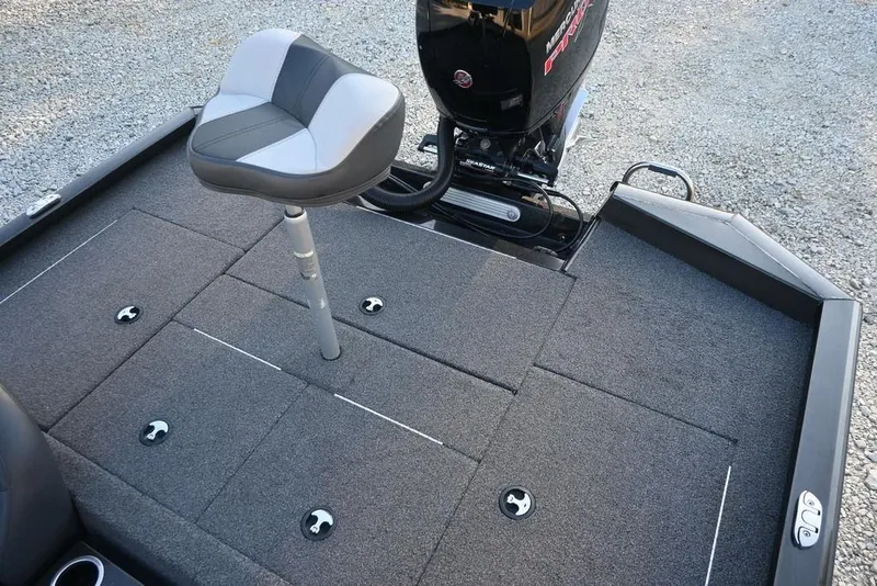 Slide: The Image of 2022 Vexus AVX1980 boat deck with seat and motor, featuring carpeted surface. - 11