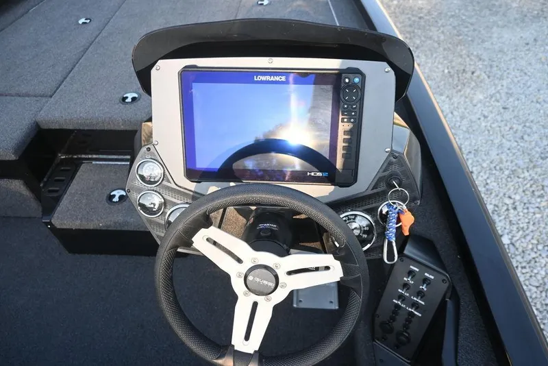 Slide: The Image of 2022 Vexus AVX1980 boat dashboard with Lowrance HDS12 display and steering wheel. - 5