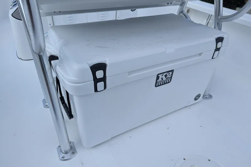 Slide: The Image of 2026 BlackJack 224 boat with Yamaha outboard engine and white cushioned seating. - 15