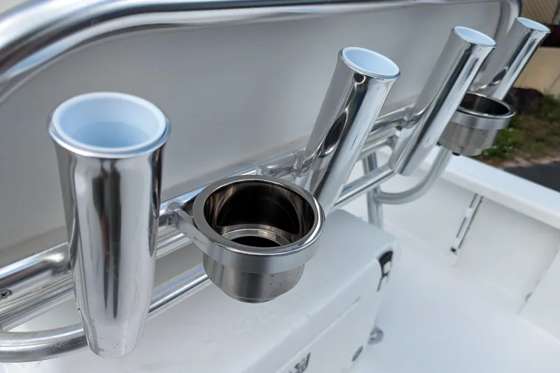 Slide: The Image of Open storage compartments on a 2026 BlackJack 224 boat deck. - 22