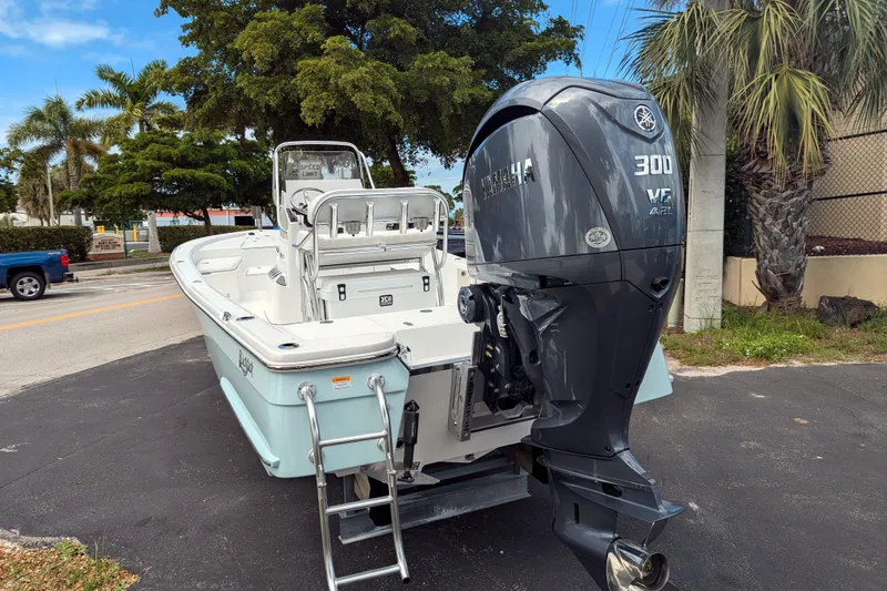 Slide: The Image of 2026 BlackJack 224 boat with Yamaha engine displayed outdoors. - 7