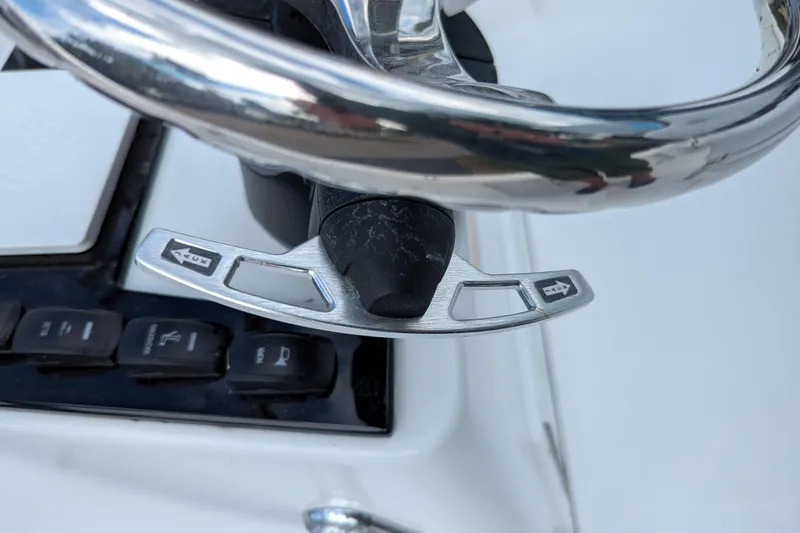 Slide: The Image of 2026 BlackJack 224 boat with Yamaha 300 engine, parked outdoors. - 9