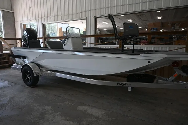 The Image of 2026 Thor Lake Hammer 1900CC boat on trailer in showroom. - 0