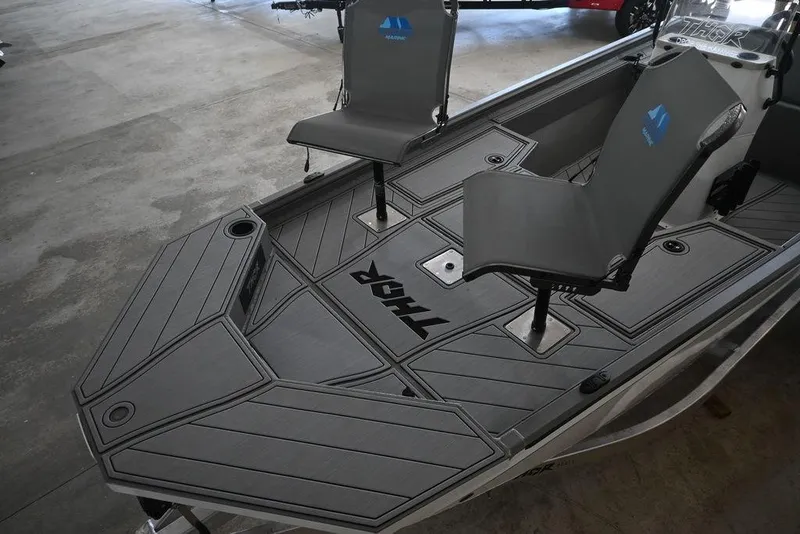 Slide: The Image of 2026 Thor Lake Hammer 1900CC boat interior with sleek seating and modern design. - 4