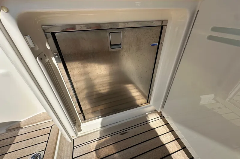 Slide: The Image of Stainless steel refrigerator on 2012 Sea Ray 470 Sundancer yacht deck. - 11