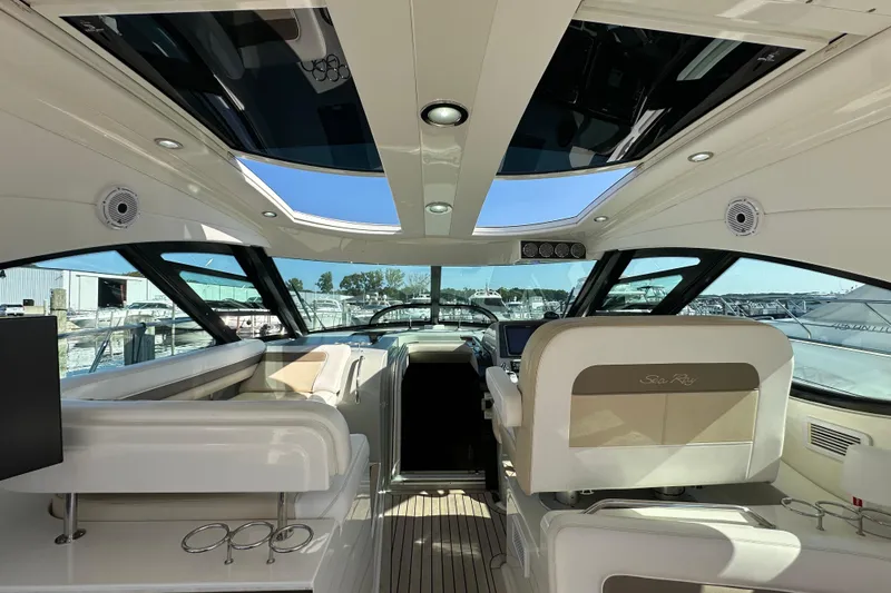 Slide: The Image of Interior of 2012 Sea Ray 470 Sundancer yacht with modern design and panoramic windows. - 12