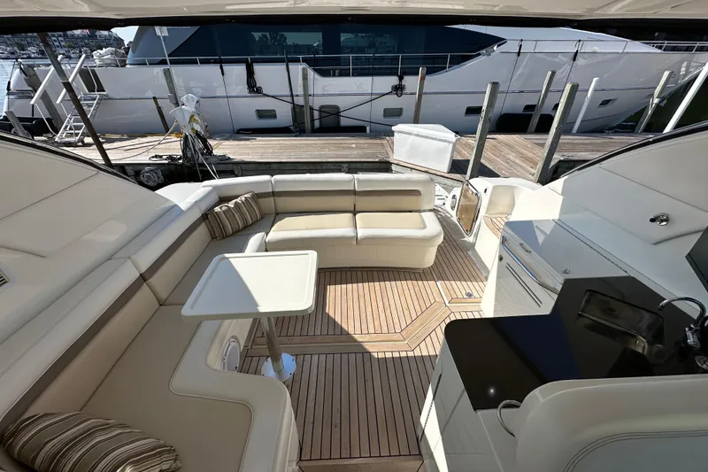 Slide: The Image of Luxurious 2012 Sea Ray 470 Sundancer yacht interior with elegant seating and modern amenities. - 13