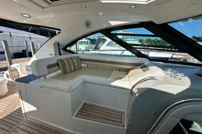 Slide: The Image of Luxurious interior of 2012 Sea Ray 470 Sundancer yacht with elegant seating and modern design. - 14