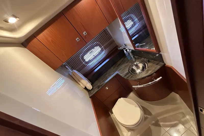 Slide: The Image of Luxurious bathroom interior of 2012 Sea Ray 470 Sundancer yacht with modern fixtures. - 24