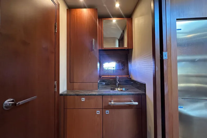 Slide: The Image of Luxurious wooden interior of 2012 Sea Ray 470 Sundancer yacht bathroom. - 27