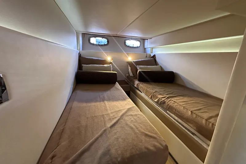 Slide: The Image of Cozy twin cabin interior of 2012 Sea Ray 470 Sundancer yacht. - 28