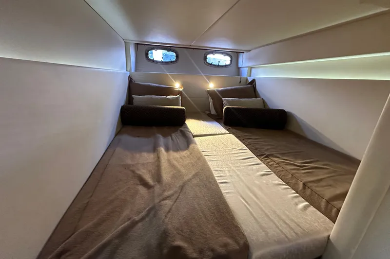 Slide: The Image of Cozy twin bed cabin in 2012 Sea Ray 470 Sundancer yacht. - 29