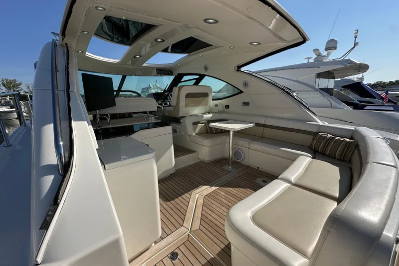 Slide: The Image of Luxurious 2012 Sea Ray 470 Sundancer yacht interior with plush seating and modern amenities. - 6