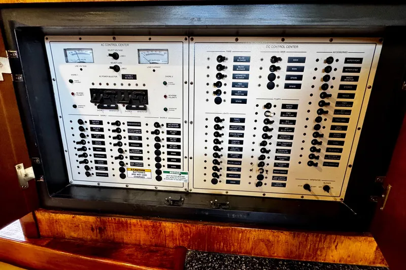Slide: The Image of Electrical control panel on a 2000 Trojan 440 Express boat. - 30
