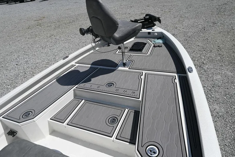Slide: The Image of 2025 Avid 21 Mag boat deck with seating and Garmin equipment. - 1