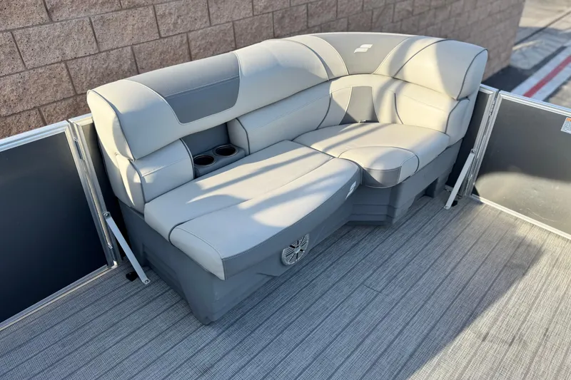 Slide: The Image of 2019 Starcraft EX 20 C pontoon boat seating with cup holders and modern design. - 10