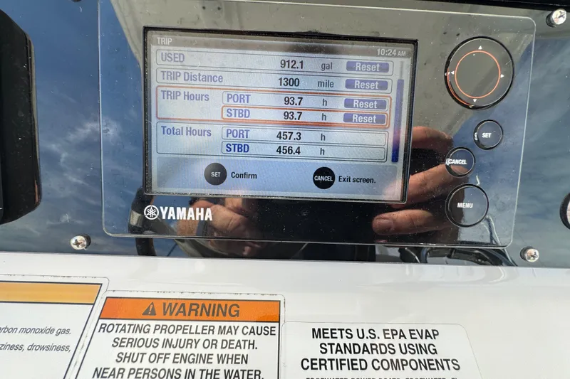 Slide: The Image of Yamaha boat display showing trip data on 2016 Edgewater 320CC. - 18
