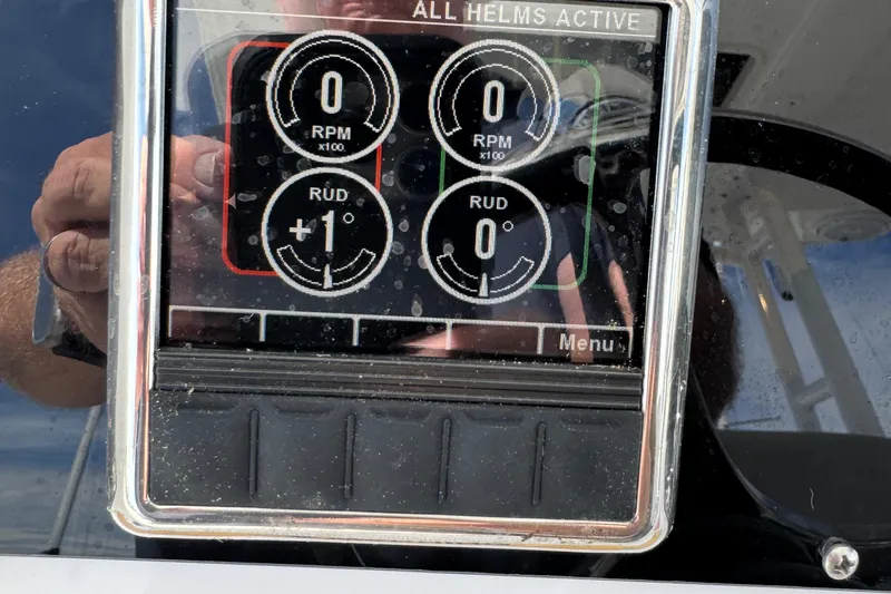 Slide: The Image of Display panel on a 2016 Edgewater 320CC boat showing RPM and rudder angle. - 19