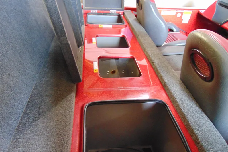 Slide: The Image of Interior of a 2011 Stratos 183 Elite boat showing storage compartments and seating. - 9
