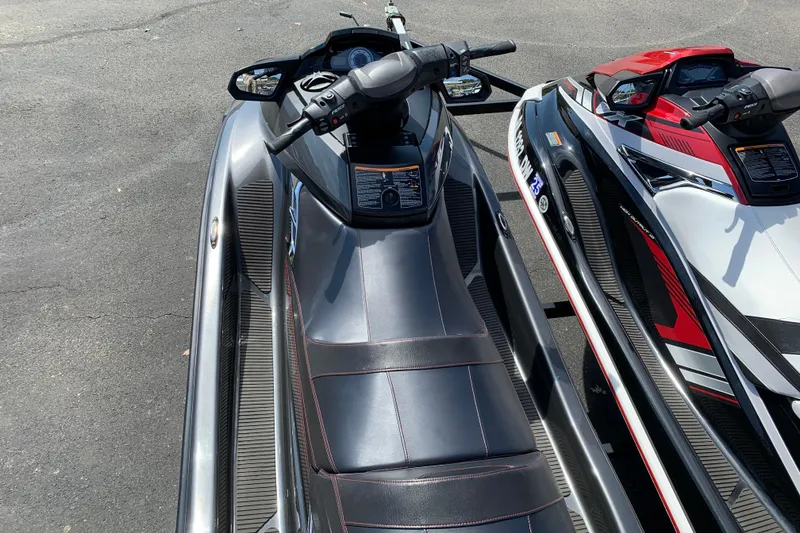Slide: The Image of 2018 Yamaha WaveRunner FX Cruiser HO parked beside another jet ski. - 4
