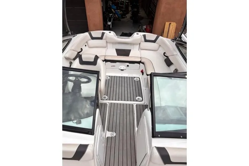 Slide: The Image of 2013 Yamaha AR192 boat interior with seating and steering wheel. - 30