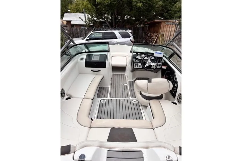 Slide: The Image of 2013 Yamaha Boats AR192 interior with seating and steering wheel. - 31