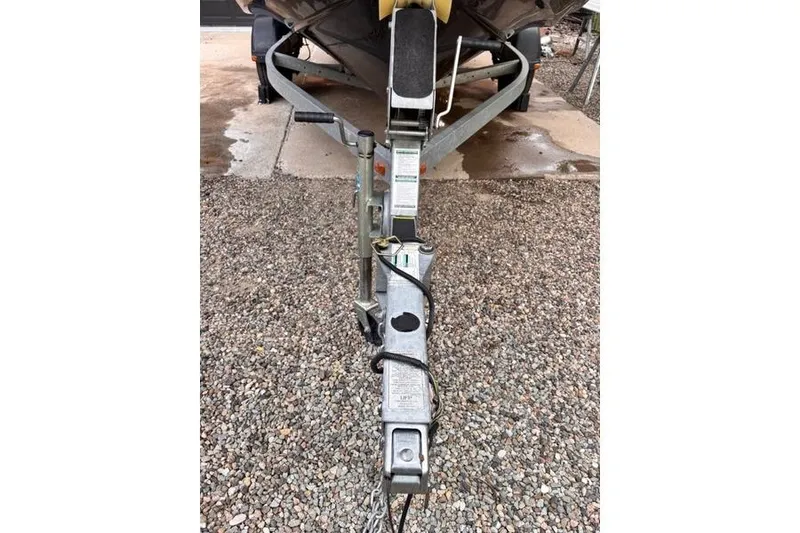 Slide: The Image of Trailer hitch of a 2013 Yamaha Boats AR192 on gravel surface. - 35