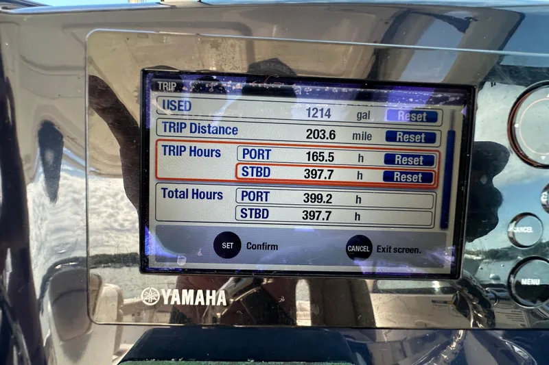 Slide: The Image of Yamaha boat display showing trip data on a 2015 Pursuit DC 265 Dual Console. - 24