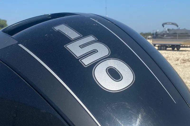 Slide: The Image of Close-up of a 150 HP outboard motor on a 2017 Tracker Targa V-18 WT boat. - 4