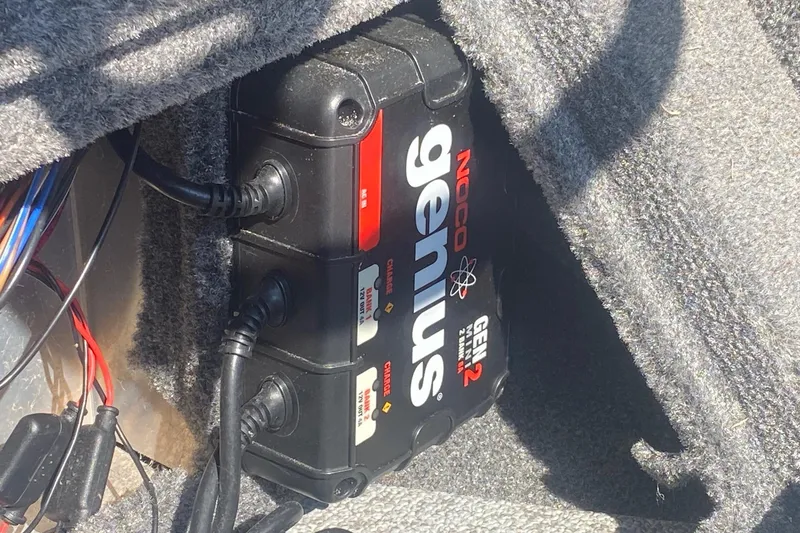 Slide: The Image of NOCO Genius GEN2 battery charger installed in 2017 Tracker Targa V-18 WT boat. - 8