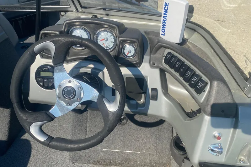 Slide: The Image of Steering console of 2017 Tracker Targa V-18 WT boat with gauges and Lowrance device. - 9
