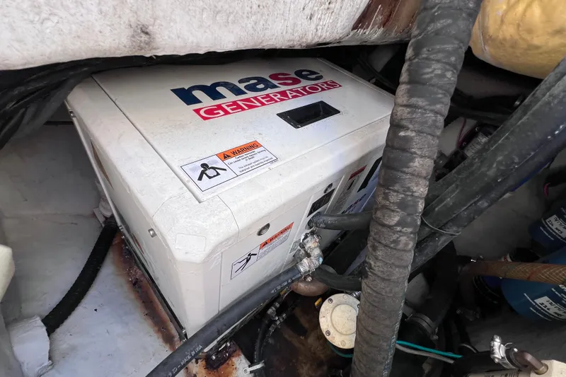 Slide: The Image of Mase generator in 2005 Century 3200 Walk-Around boat engine compartment. - 12