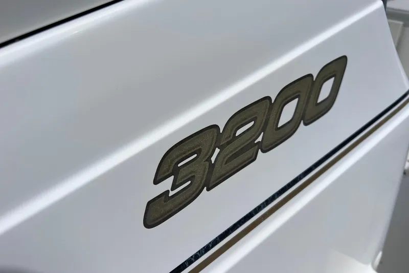 Slide: The Image of Close-up of 2005 Century 3200 Walk-Around boat model number on white surface. - 18