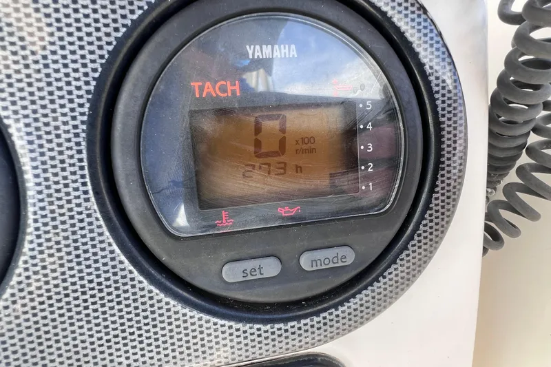 Slide: The Image of Yamaha tachometer display on 2005 Century 3200 Walk-Around boat, showing 273 hours. - 29