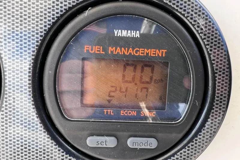 Slide: The Image of Yamaha fuel management display on 2005 Century 3200 Walk-Around boat. - 34