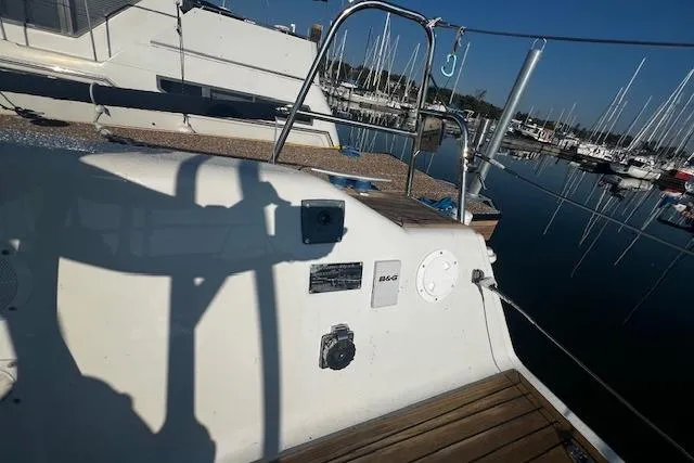 Slide: The Image of 2003 Grand Soleil 44 yacht deck with marina view and moored boats. - 16