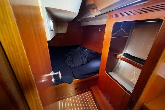 Slide: The Image of Cozy cabin interior of 2003 Grand Soleil 44 sailboat with wooden finish. - 30