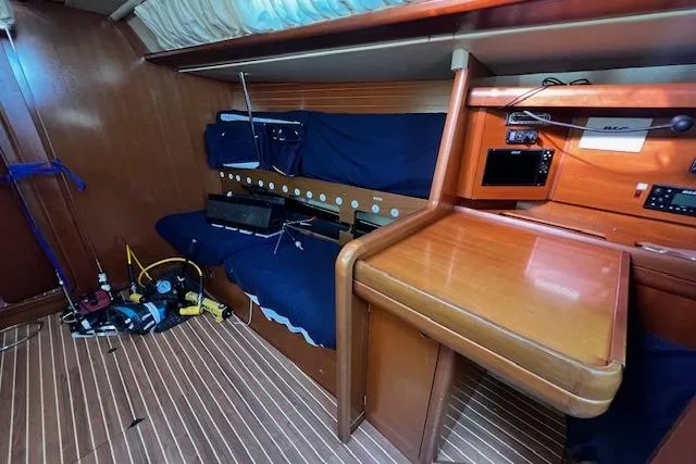Slide: The Image of Interior of 2003 Grand Soleil 44 sailboat with navigation station and equipment. - 36
