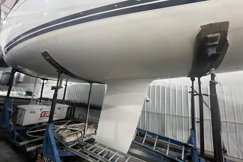 Slide: The Image of Grand Soleil 44 sailboat from 2003 in dry dock, showing hull and keel. - 39