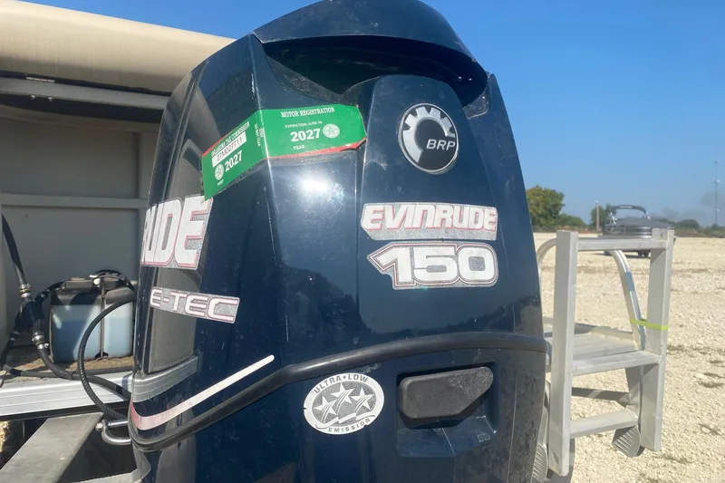 Slide: The Image of 2008 Bentley Pontoons Prestige 223LC with Evinrude 150 outboard motor, registration valid until 2027. - 4