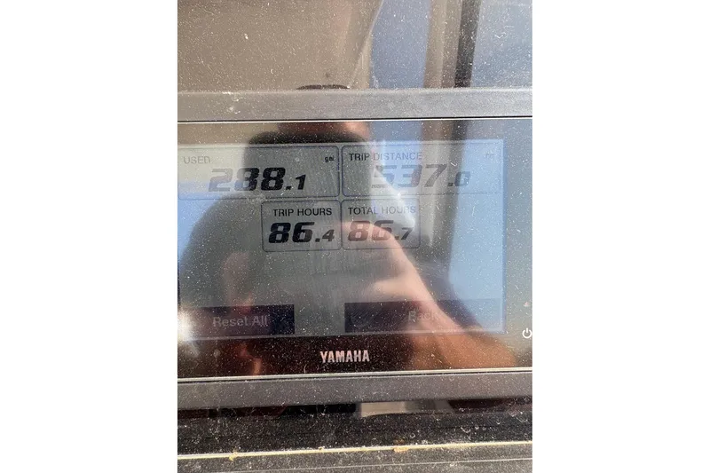 Slide: The Image of Display screen showing trip data on a 2023 Edgewater 248 CX boat. - 20