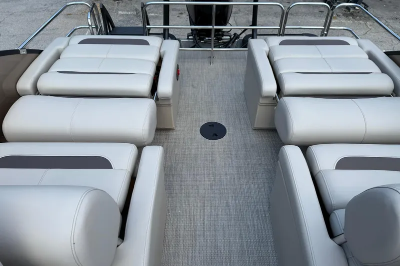 Slide: The Image of 2025 Bentley Pontoons Legacy 223 QSB interior with luxurious seating arrangement. - 14